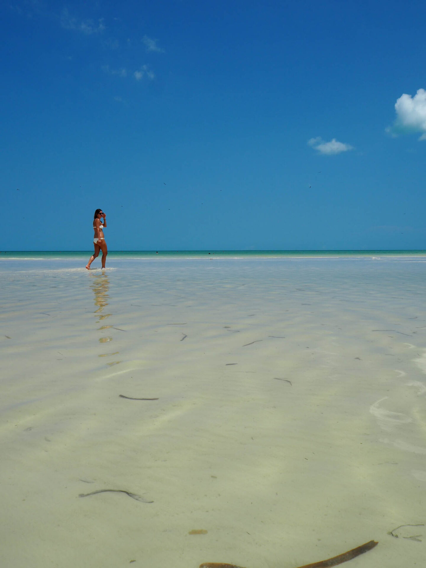 Holbox Mexico walking on the beach
