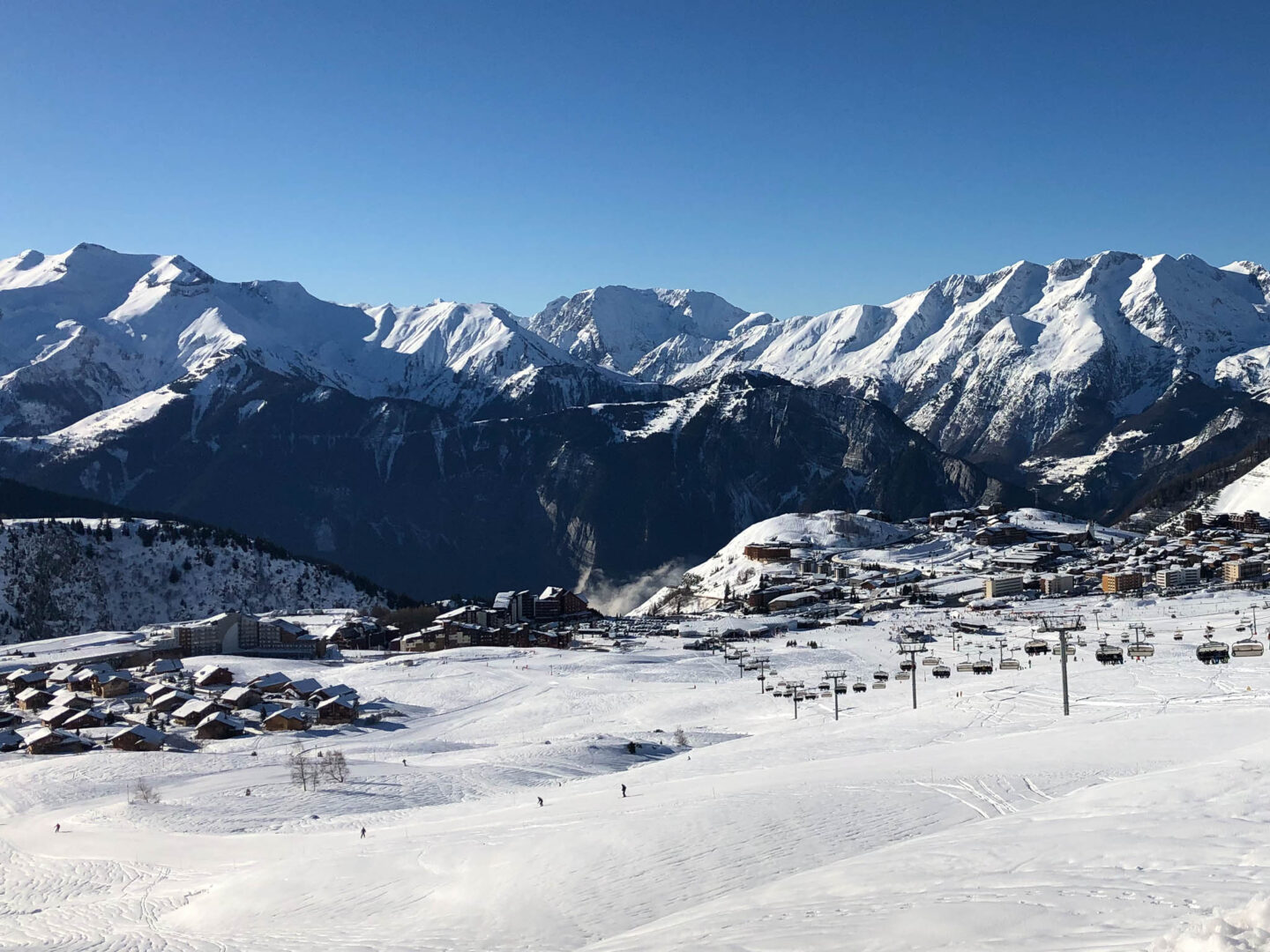 Alpe d Huez chairlifts bluebird day