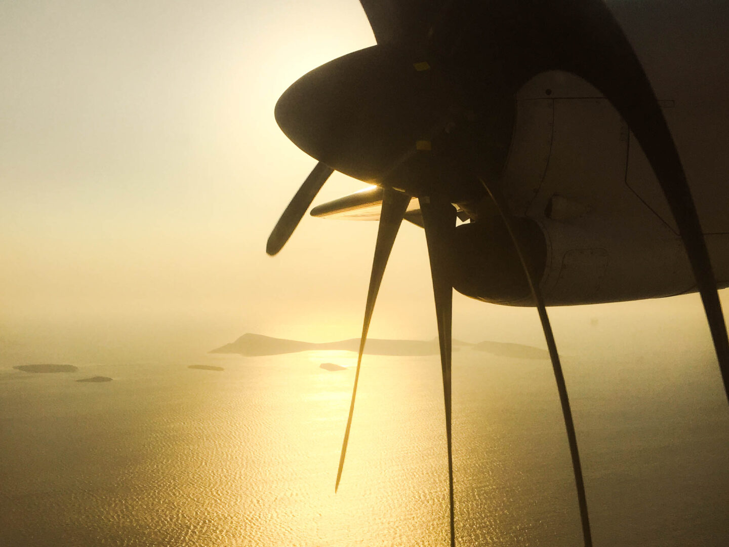 Propeller plane sunset
