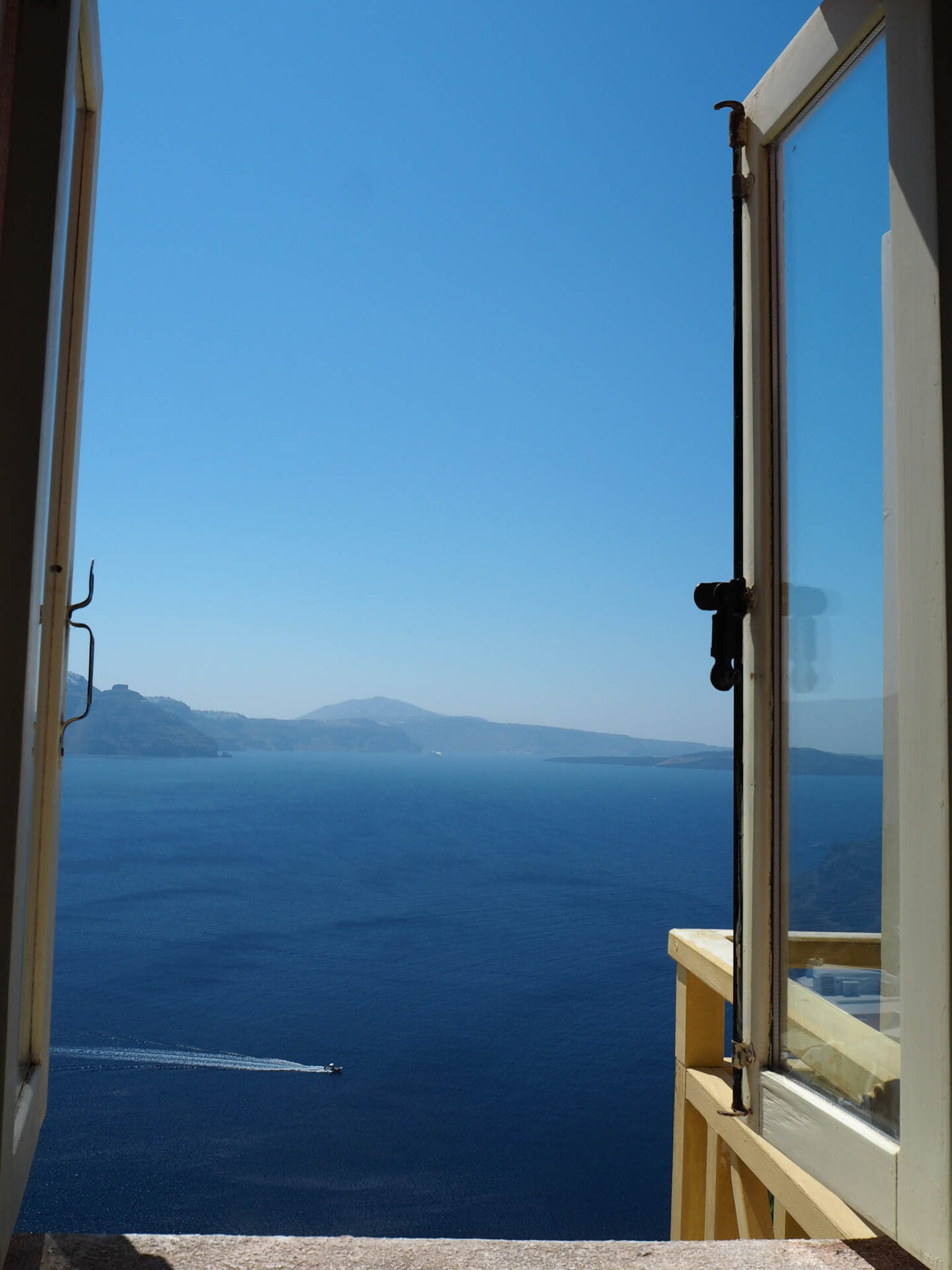 Santorini Oia window with caldera view