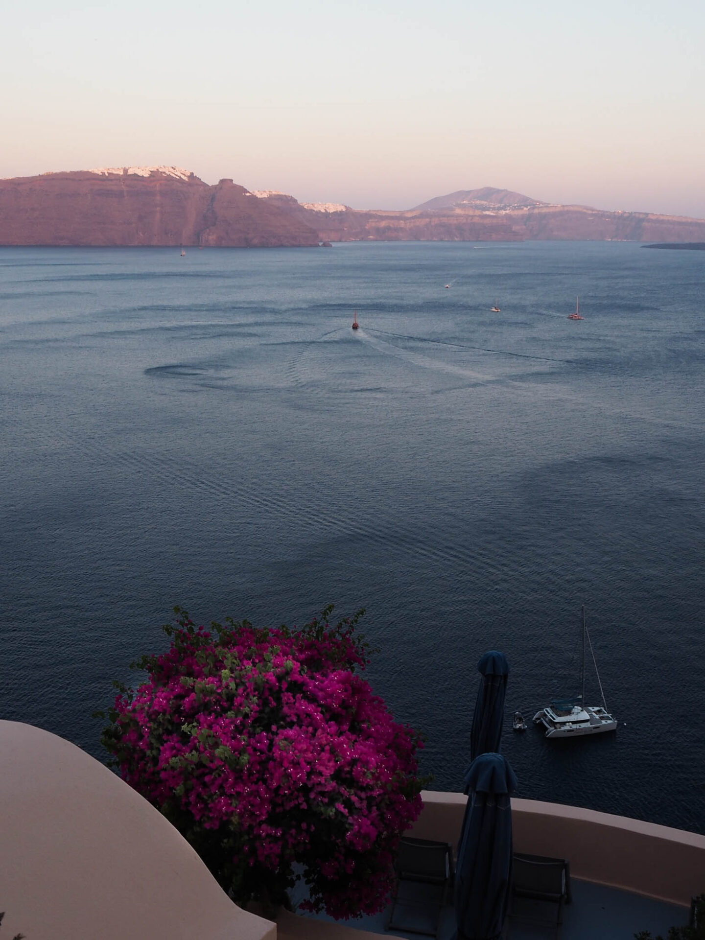 Santorini Oia sunset purple caldera