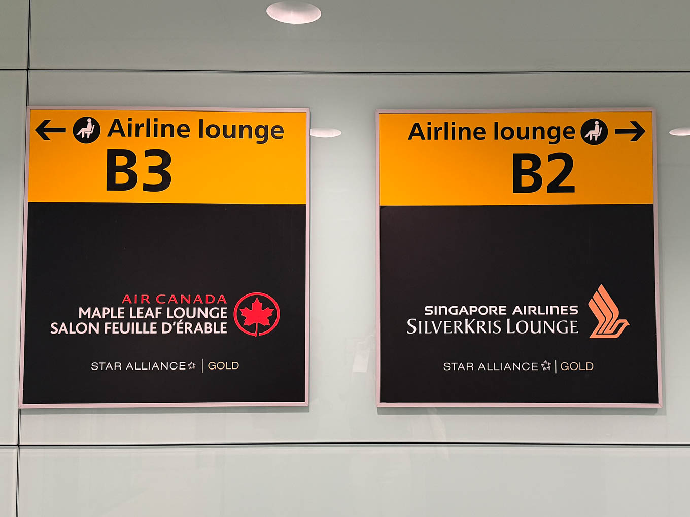 Heathrow T2 Singapore and Air Canada lounge signage